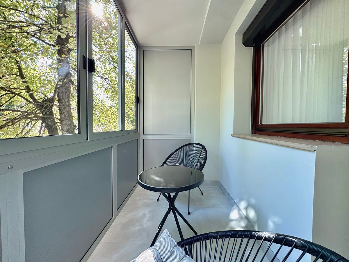 Glazed balcony off the living room