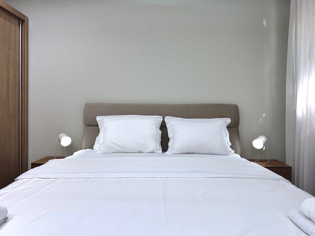 Headboard of the double bed with reading lights