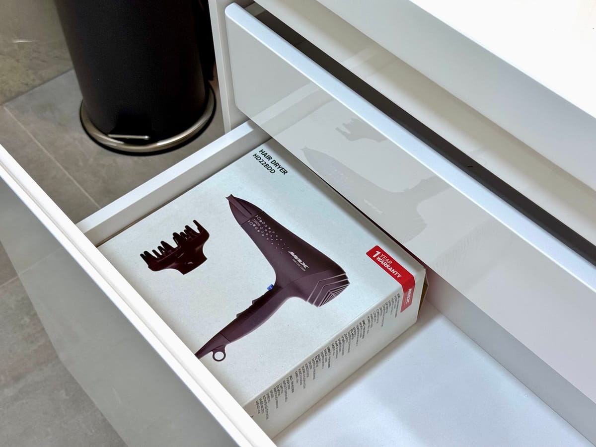 Hair dryer in the drawer