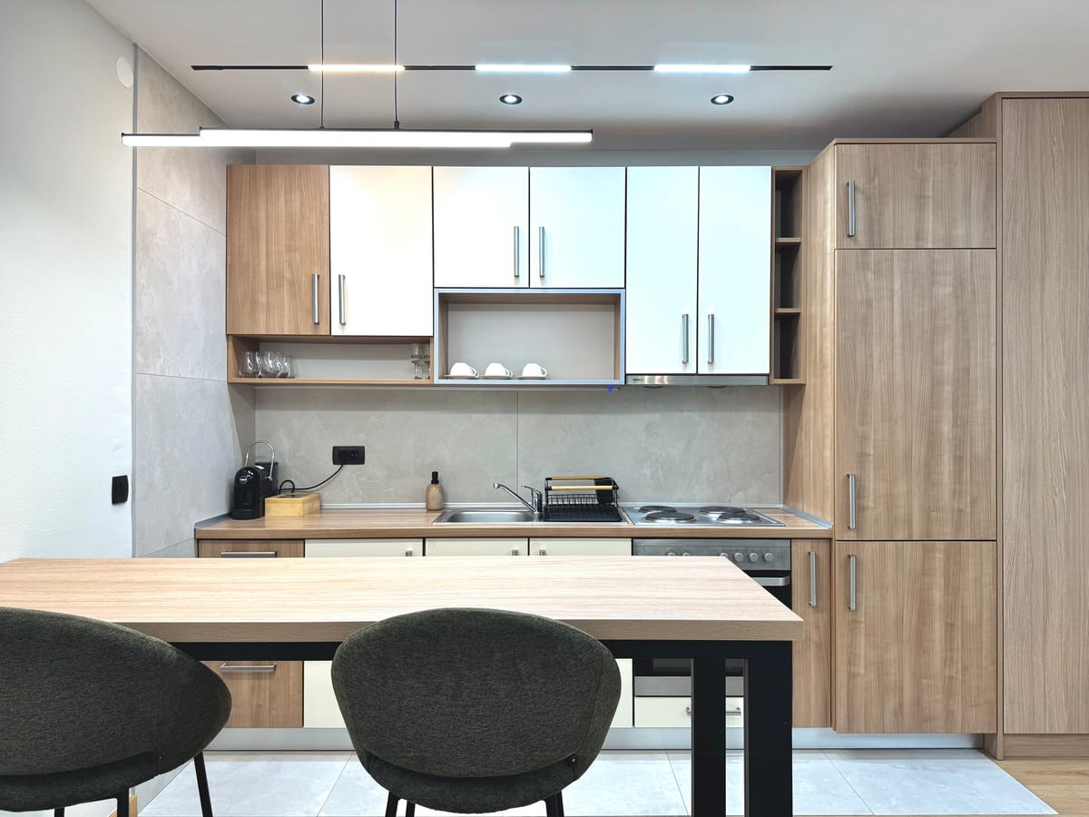 Kitchen with wall units and worktop