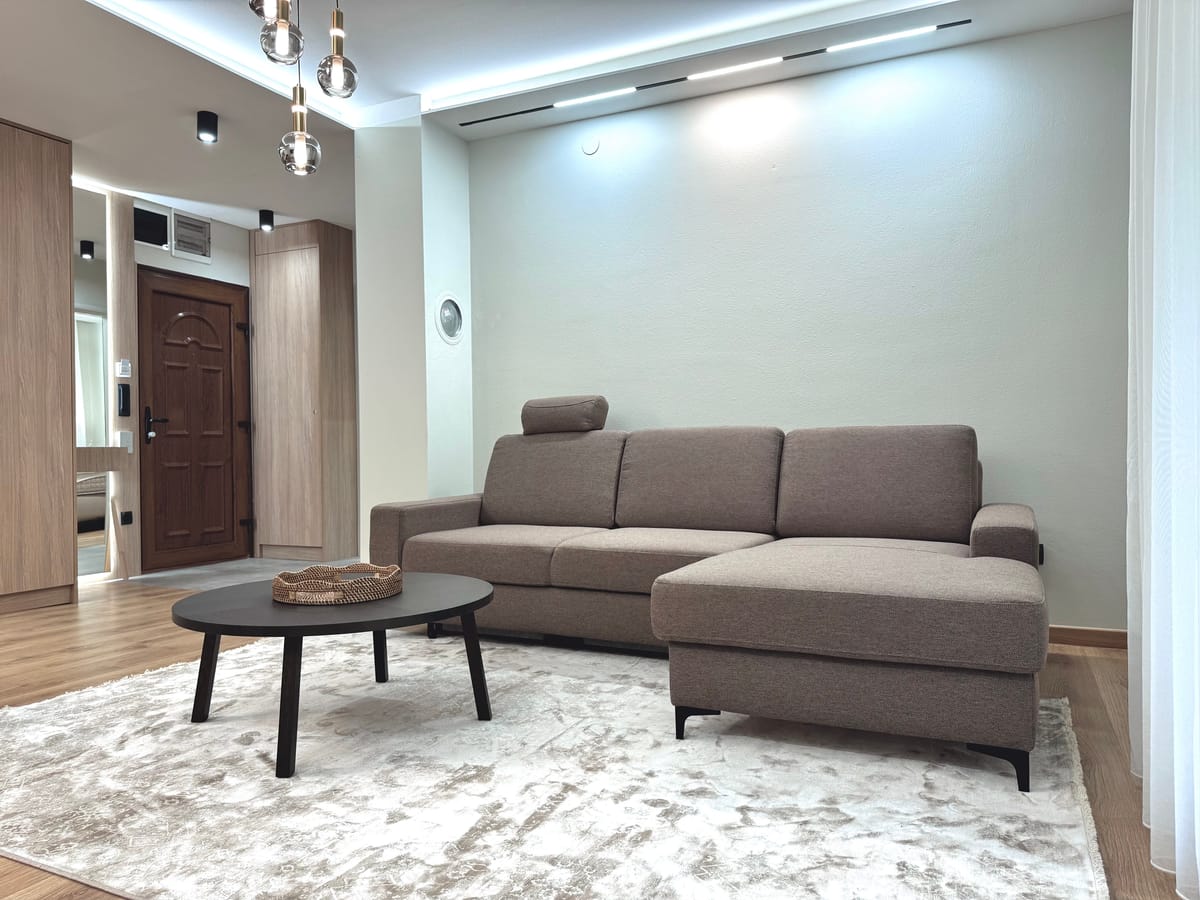 Corner sofa and round coffee table in the living room